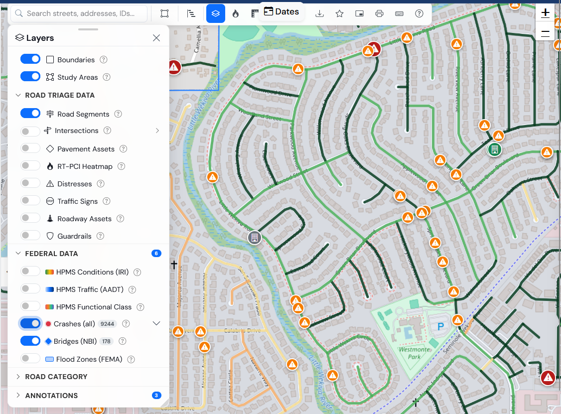 Helm layers panel — RT road triage layers (Road Segments, Intersections, Distresses, Traffic Signs, Roadway Assets) stacked with federal data layers (HPMS, FHWA Functional Class, Crashes, Bridges) on a single map